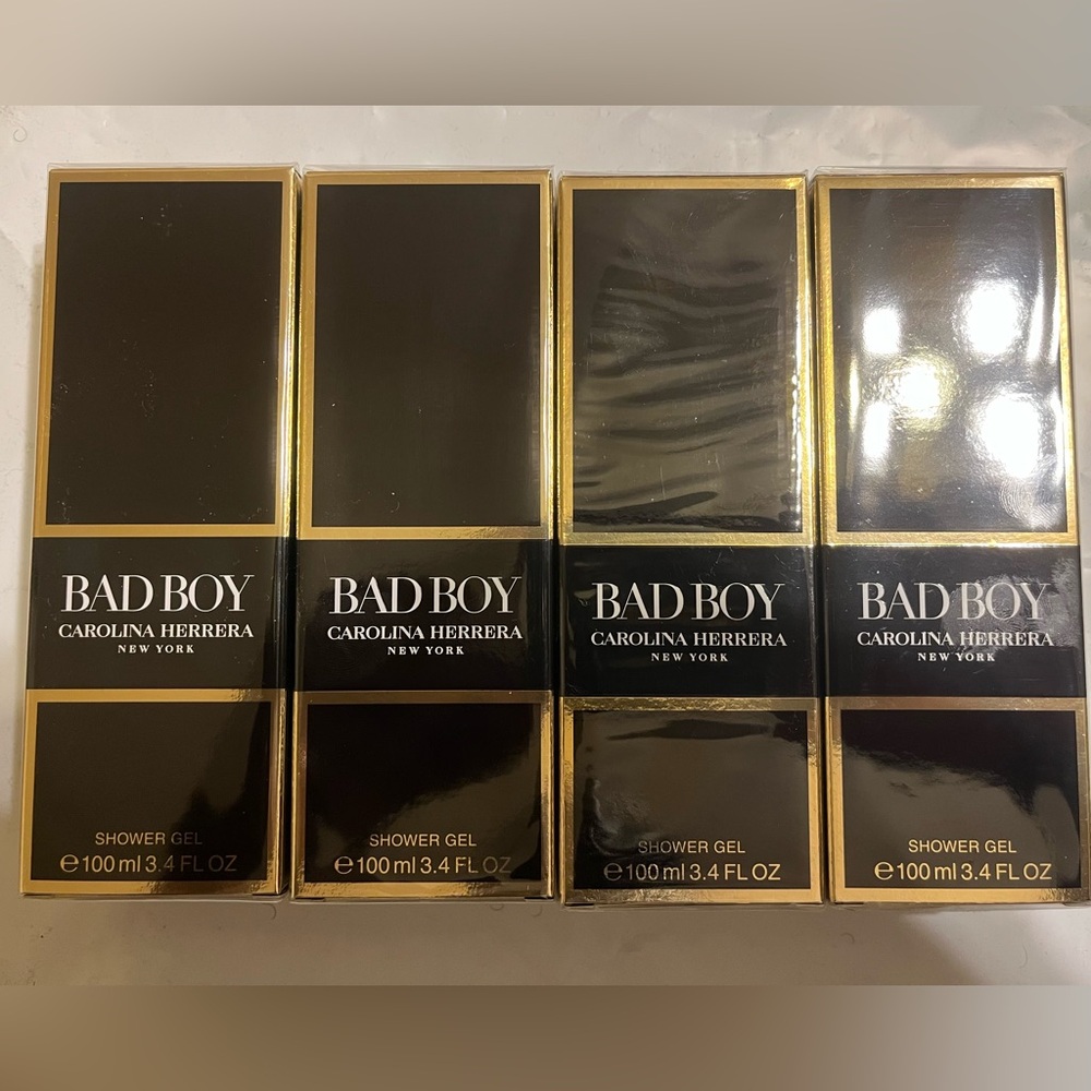 Carolina Herrera Bad Boy Shower Gel Black and Gold 4 new bottler. 3.4 oz bottles